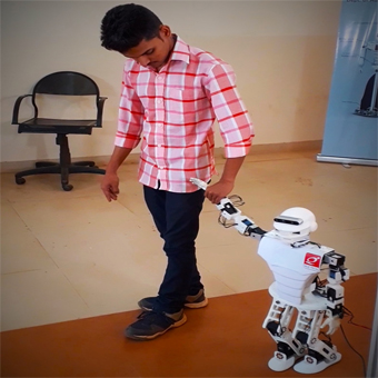 Subrahmanya working with humanoid robot AJIT 2.0